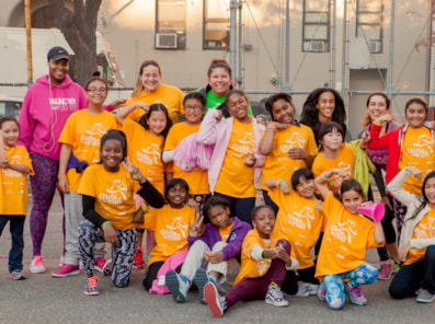 Girls on the Run participant smiles outdoors 